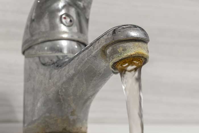 Limescale And Other Hard Water Deposits On A Tap