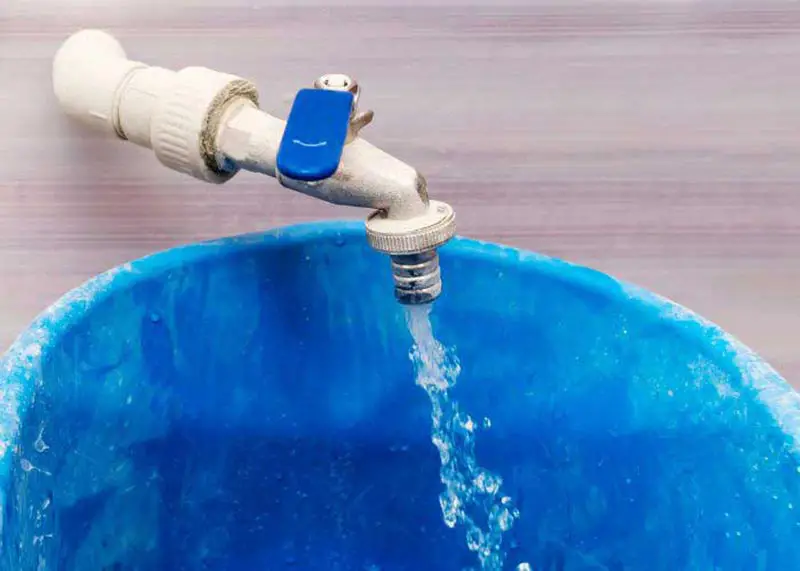 Image of tap water as a hard mineral rich water source.